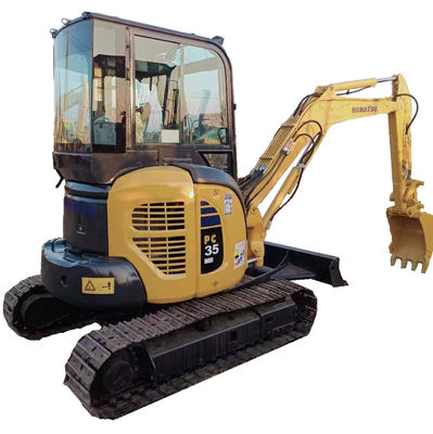 Mini-excavatrice Komatsu PC35 de seconde main avec 11,2 kW de puissance et une capacité de seau de 0,2 M3