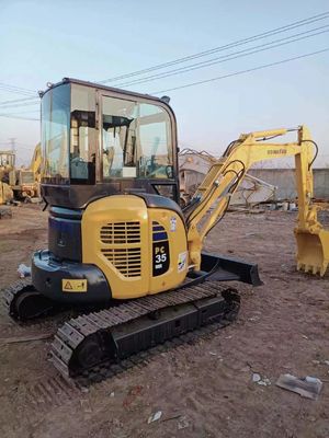 Mini-excavatrice Komatsu PC35 de seconde main avec 11,2 kW de puissance et une capacité de seau de 0,2 M3